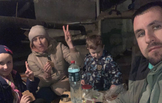 Yevhen with his family in basement