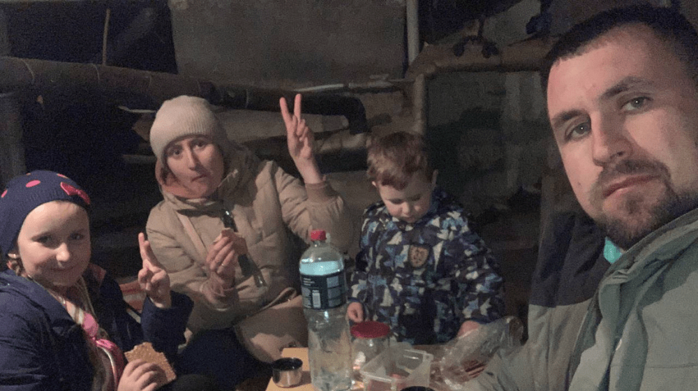 Yevhen with his family in basement